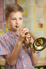 C:\Users\acer\Desktop\depositphotos_71340885-stock-photo-boy-learning-to-play-trumpet.jpg